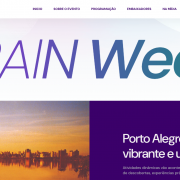 Captura de tela do site Brain Week, com logotipo no topo e menu de navega&ccedil;&atilde;o. No centro, o nome &ldquo;Brain Week&rdquo; em destaque. Abaixo, h&aacute; foto do p&ocirc;r do sol em Porto Alegre e texto sobre atividades din&acirc;micas e experi&ecirc;ncias urbanas pela cidade.